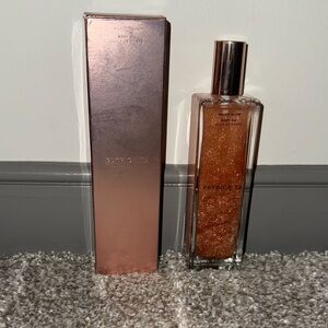 Patrick Ta Shimmering Body Oil in a vision